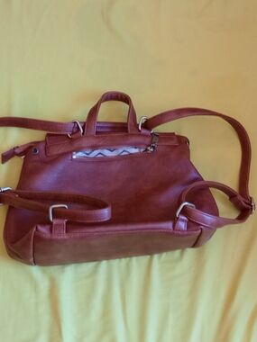 Brown vegan  faux leather backpack  from Moda Luxe, a gold-toned brand label